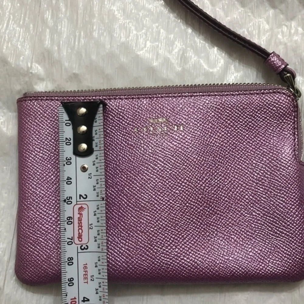 Coach purple shimmer wristlet bag